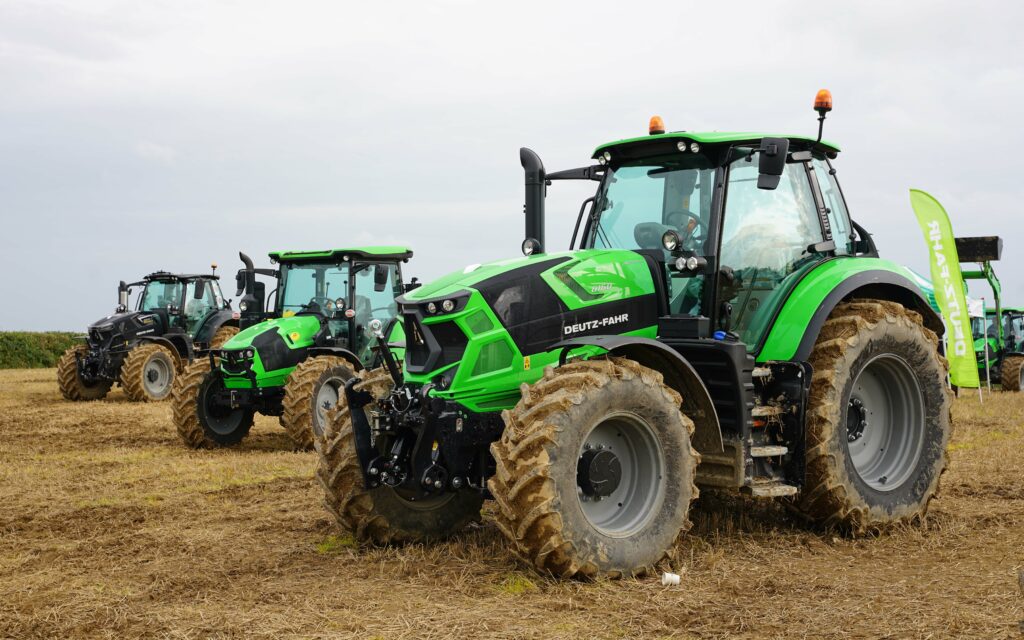 3 Deutz Tractors in field